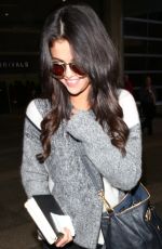 SELENA GOMEZ Arrives at Los Angeles International Airport 1203