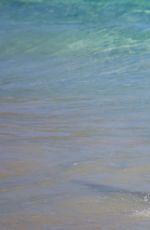 UMA THURMAN in Bikini at a Beach in St. Barts