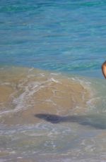 UMA THURMAN in Bikini at a Beach in St. Barts