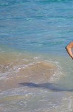 UMA THURMAN in Bikini at a Beach in St. Barts