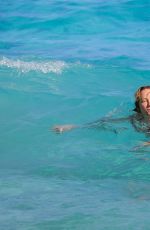 UMA THURMAN in Bikini at a Beach in St. Barts