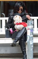 VANESSA HUDGENS Playing with Her Dog in New York