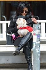 VANESSA HUDGENS Playing with Her Dog in New York