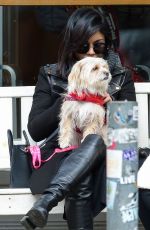 VANESSA HUDGENS Playing with Her Dog in New York