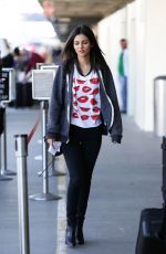 VICTORIA JUSTICE Arrives on a flight at LAX Airport 1303