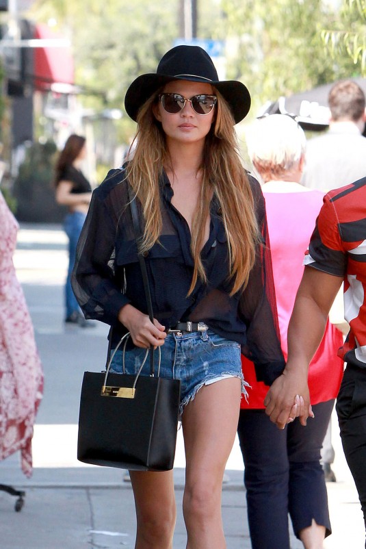 CHRISSY TEIGEN in Jeans Shorts