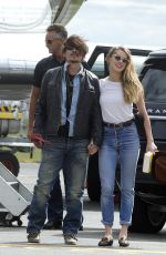 AMBER HEARD and Johnny Depp Arrives at Airport in Brisbane