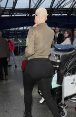 AMBER ROSE at Heathrow Airport in London 04/20/2015