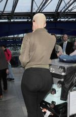 AMBER ROSE at Heathrow Airport in London 04/20/2015