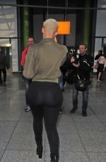 AMBER ROSE at Heathrow Airport in London 04/20/2015