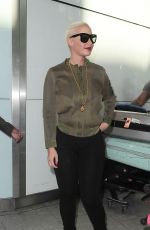 AMBER ROSE at Heathrow Airport in London 04/20/2015