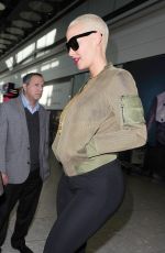 AMBER ROSE at Heathrow Airport in London 04/20/2015