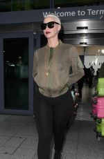AMBER ROSE at Heathrow Airport in London 04/20/2015