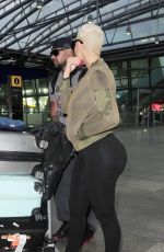 AMBER ROSE at Heathrow Airport in London 04/20/2015