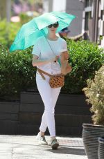 ANNE HATHAWAY Out and About in New York 04/29/2015