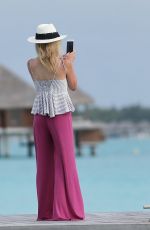 AVA SAMBORA in Bikini Paddleboarding in Bora Bora