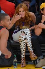 BELLA THORNE and Ryan Nassif Kissing at Lakers Game in Los Angeles