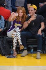 BELLA THORNE and Ryan Nassif  Kissing at Lakers Game in Los Angeles