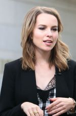 BRIDGIT MENDLER on the Set of Extra in Los Angles
