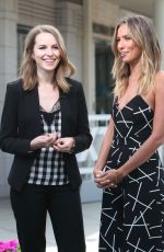 BRIDGIT MENDLER on the Set of Extra in Los Angles