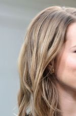 BRIDGIT MENDLER on the Set of Extra in Los Angles
