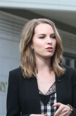 BRIDGIT MENDLER on the Set of Extra in Los Angles
