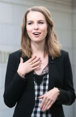 BRIDGIT MENDLER on the Set of Extra in Los Angles