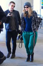 CARA DELEVINGNE at JFK Airport in New York 04/25/2015
