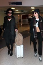 CARA DELEVINGNE at Los Angeles International Airport