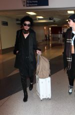 CARA DELEVINGNE at Los Angeles International Airport