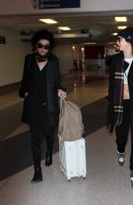 CARA DELEVINGNE at Los Angeles International Airport