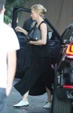 CHARLIZE THERON Arrives at Chateau Marmont in West Hollywood 04/28/2015