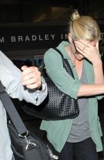 CHARLIZE THERON Arrives at LAX Airport in Los Angeles