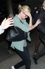 CHARLIZE THERON Arrives at LAX Airport in Los Angeles