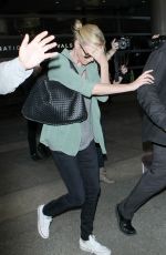 CHARLIZE THERON Arrives at LAX Airport in Los Angeles