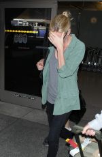CHARLIZE THERON Arrives at LAX Airport in Los Angeles