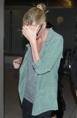CHARLIZE THERON Arrives at LAX Airport in Los Angeles