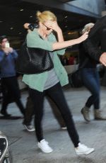 CHARLIZE THERON Arrives at LAX Airport in Los Angeles