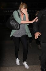 CHARLIZE THERON Arrives at LAX Airport in Los Angeles