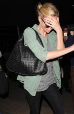 CHARLIZE THERON Arrives at LAX Airport in Los Angeles