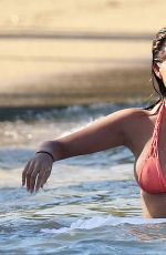 CHRISSY TEIGEN in Bikini on the Beach in The Caribbean