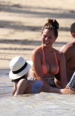 CHRISSY TEIGEN in Bikini on the Beach in The Caribbean