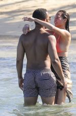 CHRISSY TEIGEN in Bikini on the Beach in The Caribbean