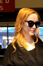 CHRISTINA HENDRICKS Arrives at Los Angeles International Airport