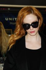 CHRISTINA HENDRICKS Arrives at Los Angeles International Airport