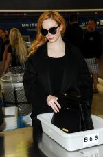 CHRISTINA HENDRICKS Arrives at Los Angeles International Airport