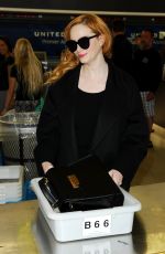 CHRISTINA HENDRICKS Arrives at Los Angeles International Airport