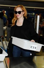 CHRISTINA HENDRICKS Arrives at Los Angeles International Airport