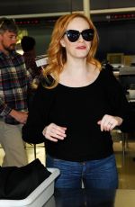 CHRISTINA HENDRICKS Arrives at Los Angeles International Airport