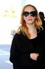 CHRISTINA HENDRICKS Arrives at Los Angeles International Airport